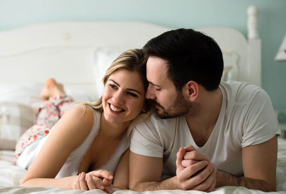 couple-in-love-wearing-pajamas-lying-in-bed-2025-03-31-09-52-34-utc