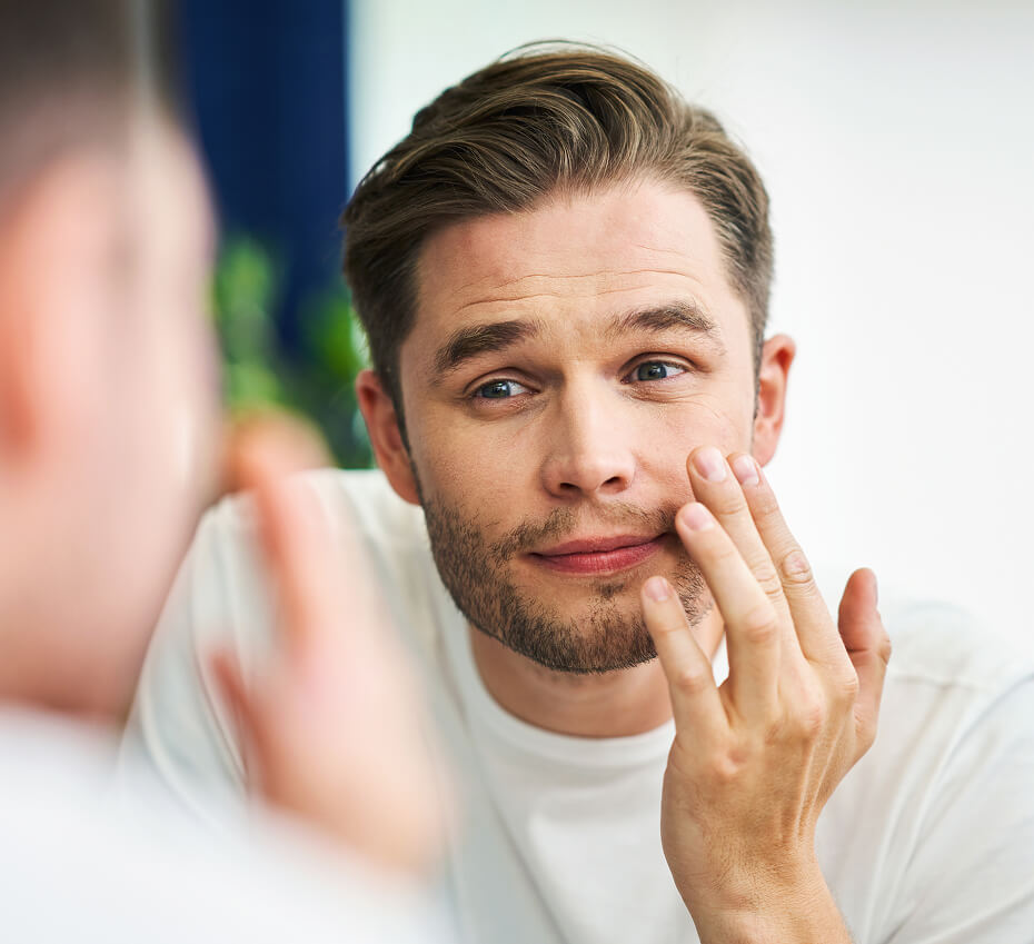portrait-of-adult-man-shaving-in-the-bathroom-2025-01-09-00-36-43-utc